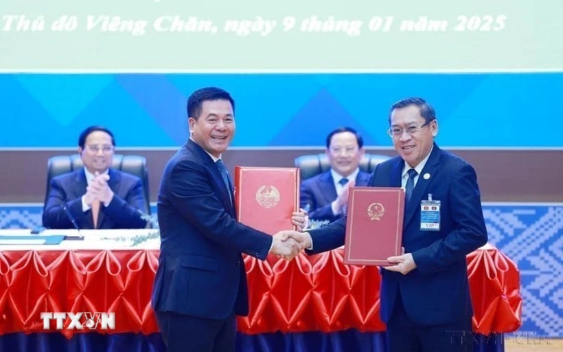 Việt Nam-Lào hướng tới quan hệ thương mại hiệu quả bền vững